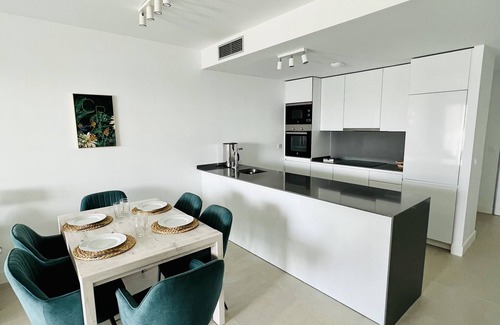 Alcorrin Apartment | Pure South – Modern Elegance with Sea View