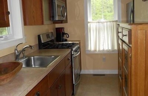 Gilford House | Quaint And Cozy Cottage Nestled In The Heart Of All The Lake Has To Offer