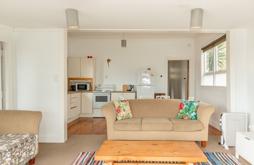 Ngakawau House | Quaint beachfront cottage. Sunny deck and views.