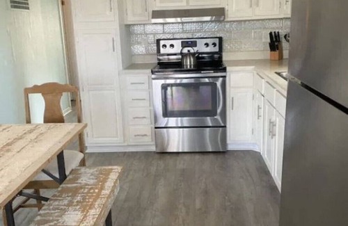 Prime Hook Beach House | Quiet dog friendly home overlooking nature preserve, 1 block from private beach.