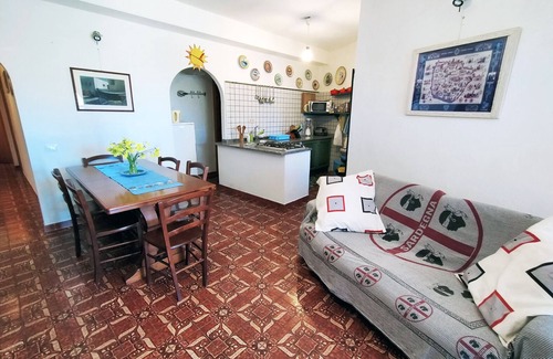 Sa Rocca Tunda Apartment | Quiet Ground Floor Apartment 20 meters from the Sea with Private Garden & BBQ