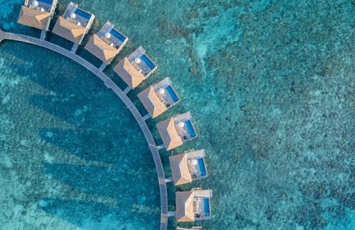Huruelhi Island Resort | Radisson Blu Resort Maldives with 50 percent off on Sea Plane round trip 03 nights & above