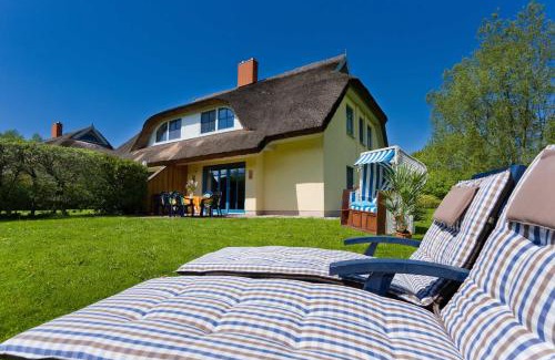 Puddemin House | Reetdachhaus Eibe 2, Kaminofen, Sauna, 8 Personen, W-Lan