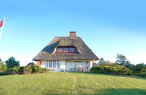 Greveling House | Reetdachhaus mit direktem Meerblick