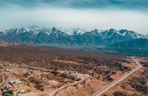 Potrerillos Ski Chalet | Reflejo del Lago - Cabañas frente al Dique Potrerillos