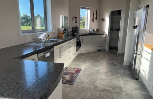 Cape Foulwind House | Relax at "Rocky Point" - a private, modern home w/cliff views of the Tasman Sea.