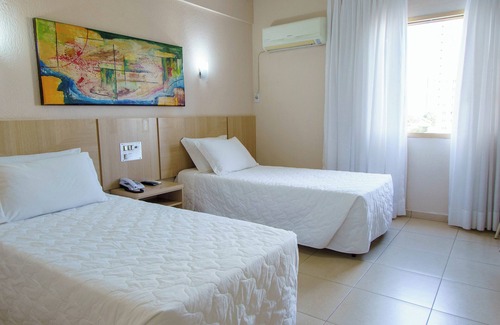 Foz do Iguacu City Centre Hotel | Relax in Style: Twin Comfort for Friends and Families Exploring Iguazu Wonders