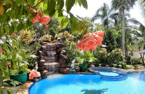 Nong Pla Lai Villa | Relaxing Palm Pool Villa, & Tropical Illuminated Garden & Private Swimming Pool.
