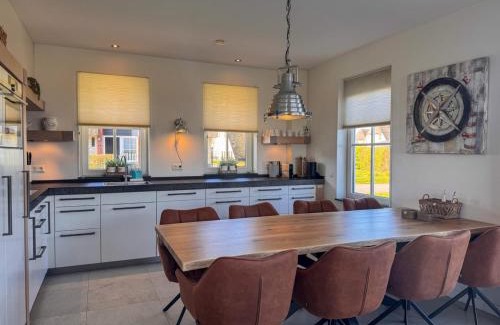 Delfstrahuizen Villa | Relaxing Villa with Fireplace