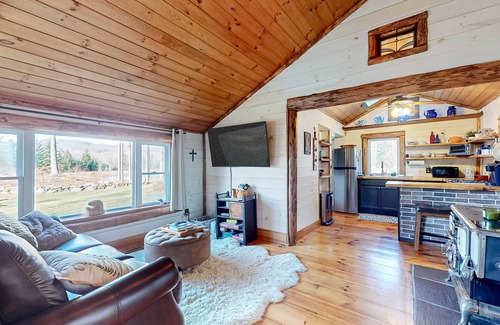 North Troy Cabin | Renovated historic cabin with mountain views, lake access, & electric fireplace