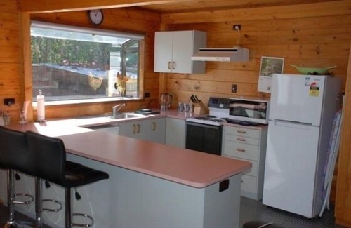 Manunui House | River View Cottage, nestled in a private setting