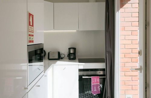 Santa Engracia Apartment | River View Studio w/Terrace by LovelyStay