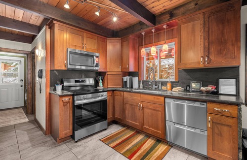 Leavenworth Cabin | Riverfront Chalet, 2 Bedroom + Loft, Sleeps 4 guests, with a hot tub.