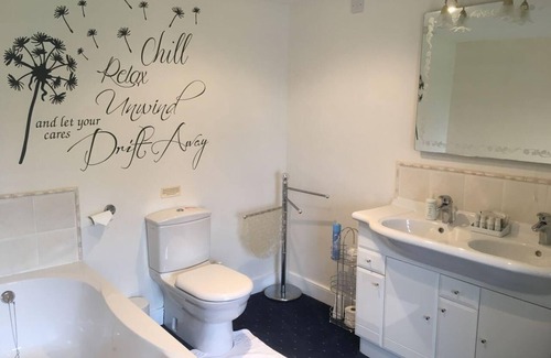 Lower Godney Bed & Breakfast | Romantic Four Poster Bed Room on Somerset Levels