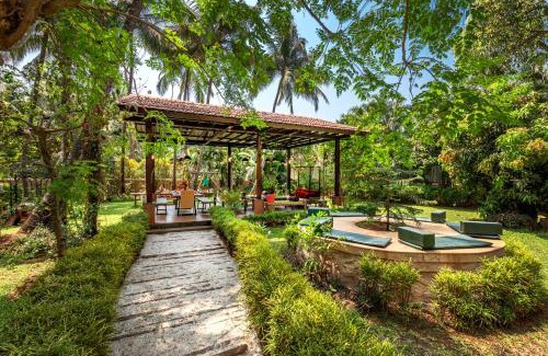 Alibaug Villa | Saffronstays Casa Del Palms, Alibaug - luxury pool villa with chic interiors, alfresco dining and island bar