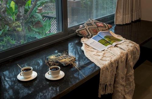 Wai Villa | SaffronStays Red Brick House, Panchgani - rustic villa with huge lawn and terrace