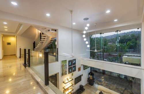 Tungarli Villa | SaffronStays Vedanta, Lonavala - villa with lawn, plunge pool and indoor games near Tungarli Lake
