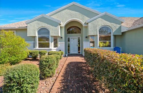 Palm Harbor House | SALTY TURTLE Luxury Salt Water Pool Home on Salt Water Canal with Tiki Bar