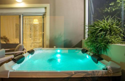 Petaloudes House | Sea Breeze & Nature villa ,near the sea, luxury jagguzi and spa private garden