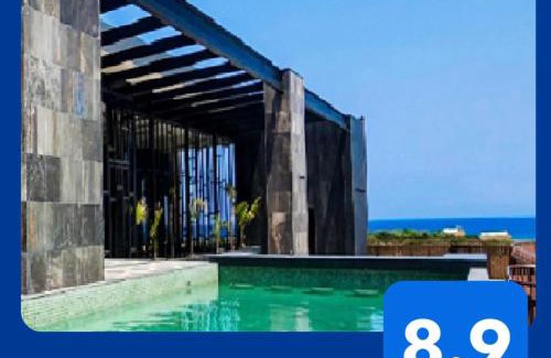 Zona Hotelera Apartment | Seascape apartment near the beach with a sea-view rooftop and infinity pool