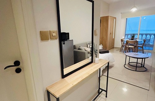 Al Hamra Village Apartment | Seaview Sanctuary Studio, Experience the Luxury of Coastal Living