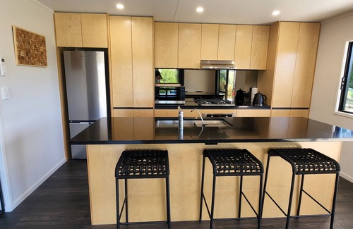 Taumarunui House | Secluded hilltop retreat with luxury and comfort.