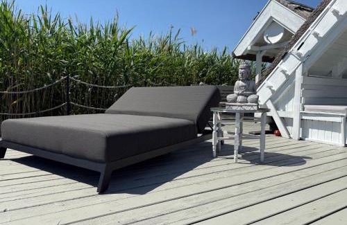 Rust House | Seehütte Neusiedlersee - Seehaus inklusive Elektroboot