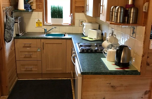 Ynysddu Cabin | Self Catering Holiday Lodge set in 6 acres of wooded Hillside in South Wales