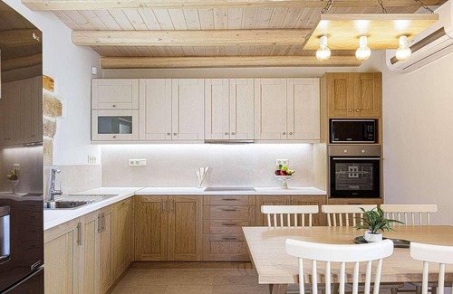 Chamalevri House | Set back from the road that runs through the tiny hamlet of Hamalevriou, this wonderfully renovated