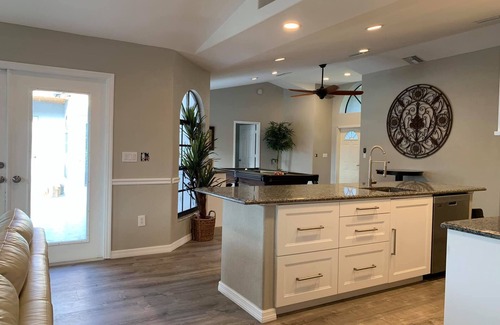 Caloosahatchee House | Sleeps 20! Heated Pool & Spa! Unique huge home. Great for large groups!
