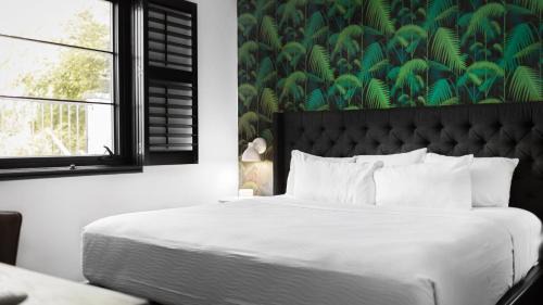 Rutledge Hill House | Sleeps 8 4 SoBro Suites w Kitchens Modern Touches – by AvantStay