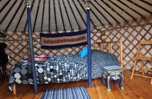 Indian Brook Resort | Small blue yurt at Cabot Shores Wilderness Resort