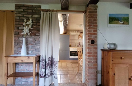 Helse House | Small historic thatched house on an old dyke