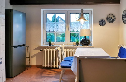 Altfunnixsiel Apartment | Smittshörn 3 - Ground floor apartments with fireplace, terrace & garden!