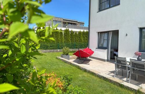 Seekirchen am Wallersee Apartment | "SONNTAGSKIND" - 2-Zimmer-Apartment mit Terrasse und Privatgarten