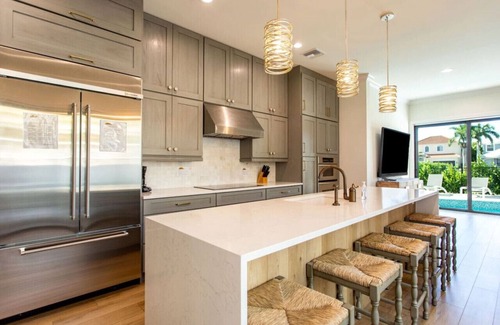 Naples Park House | Sorrento Vacation Rental + Cabana: Spacious 6-Bedroom Retreat with Private Pool & Hot Tub. Pet-Friendly, Steps from Vanderbilt Beach, with Separate Cabana. Perfect for Large Groups and Families!