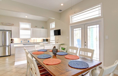 Sand Point House | Southern Comfort-in town, steps from neighborhood beach boardwalk pool hot tub