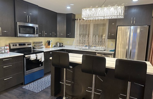 Saskatoon House | Spacious 4 Bed, 2.5 Bath, 2 Living Room house with office space