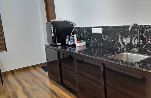 Manjoora Apartment | Spacious 4BHK in Wayanad with WiFi, AC, gym & modern amenities