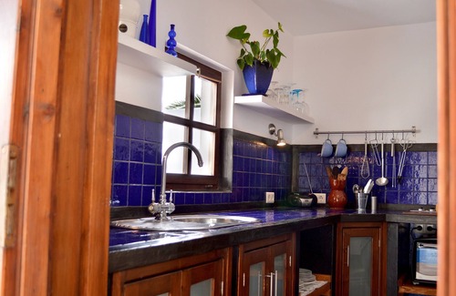 Uga House | Spacious, charming vacation apartment with private garden in historic FINCA