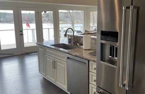 Misty River House | Spacious lakefront home with room for entertaining.