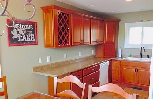 Fountain House | Spacious lakefront house on deep, all sports lake near Ludington & PM river