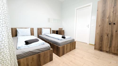 Erdberg House | Spacious Rooms - 15 Min from Airport & City Center, 5 Min from Vienna Main-Bus Station EZ9