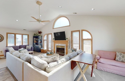 Island Quay House | Spacious & sophisticated beach retreat with balcony, games, W/D, & ocean views