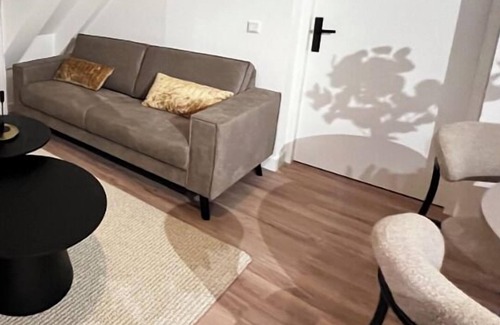 Goirle Apartment | Spacious stay with parking, WiFi, and garden views. Close to nature reserves and shops. Sleeps four.