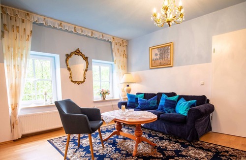 Borgerende House | Spacious suite with garden views and a bathtub