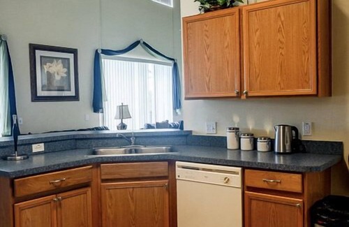 Crescent Lakes Villa | Sprawling Private Pool Home near Disney w/Pond Views & Game Room