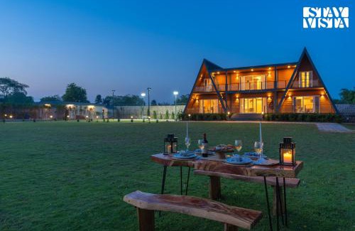 Taoru Villa | StayVista at Aarna Estate with library, lawn