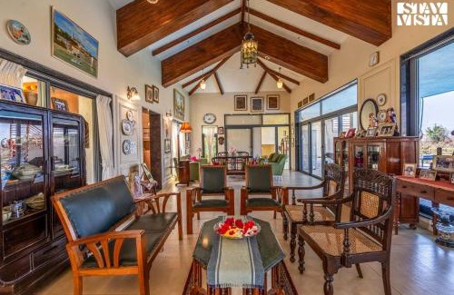 Javan Villa | StayVista at Beyond Infinity with Hill View, BBQ