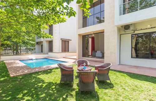 St.Stanislaus Villa Villa | StayVista at Greenwoods Villa 8 with Private Pool, Terrace, Lift & Ping-Pong Table